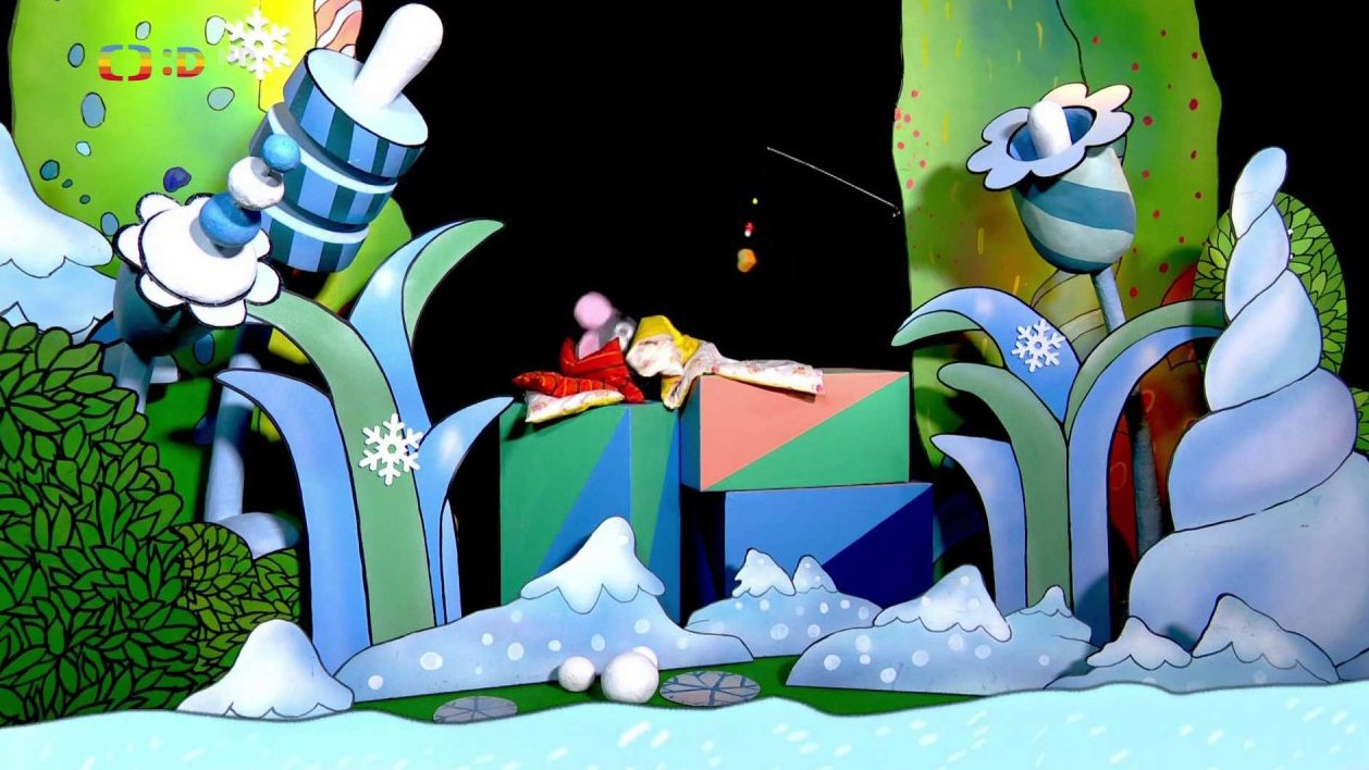 Tryskáček spí a nehodlá vstát, Tryský ho láká z postele sýrem zavěšeném na rybářském prutu.